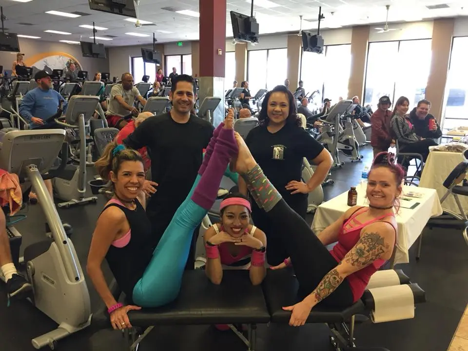 The Fitness Chiropractic team with patients at a local gym