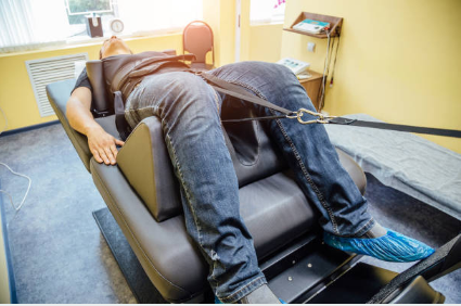 patient on spinal decompression table